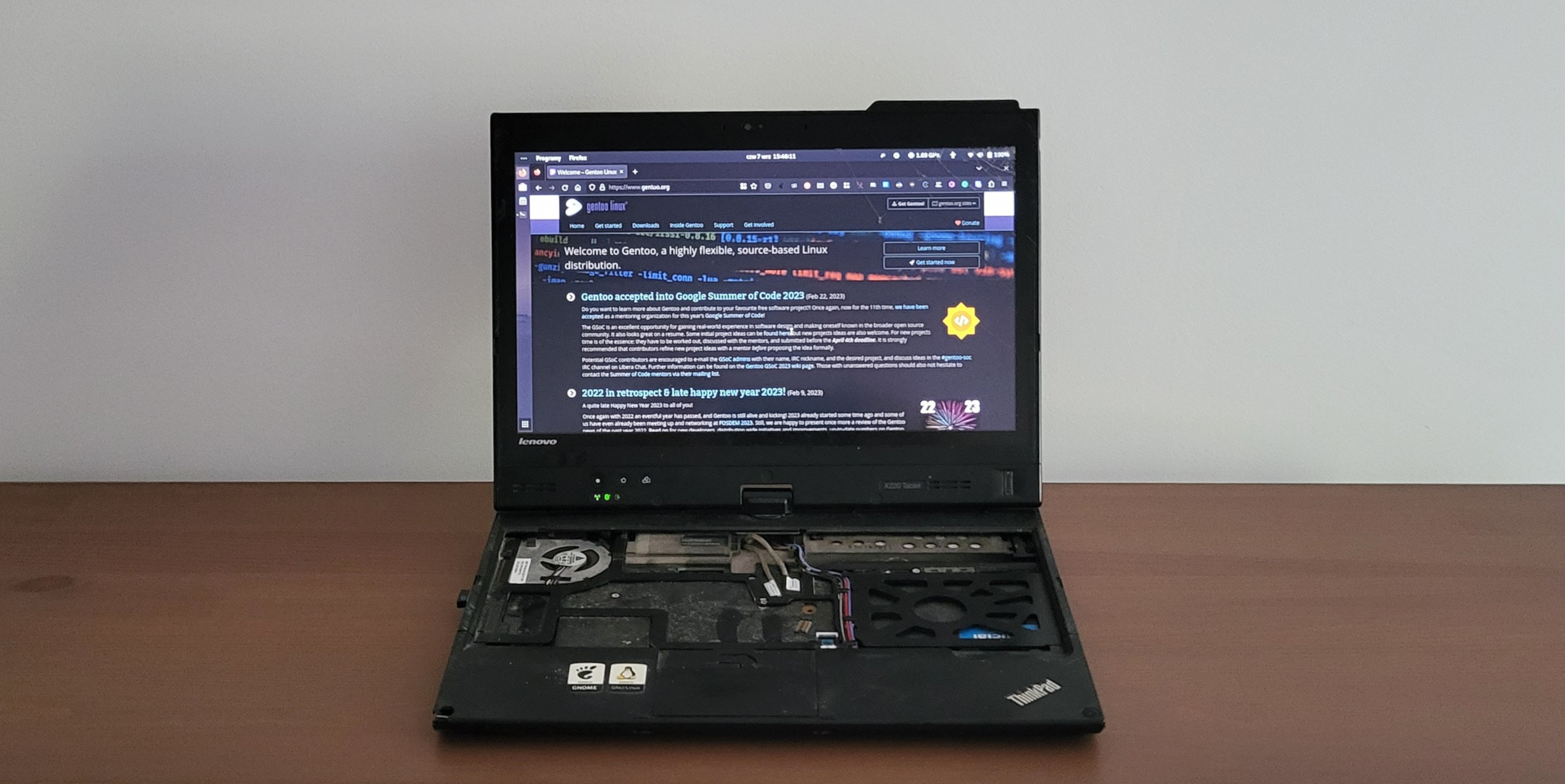 My poor Lenovo X220t. Notice the lack of keyboard (water damage) and cracked screen. It still runs though! – photo by Author